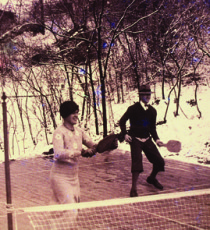 Mary Blanchard, in stylish cloche, teams with left-handed Earle Gatchell on the original Cogswell court