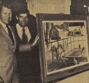 Bill Pearce, VP of Coca-Cola Bottling Company of New York, presents past president Bob Kingsbury and the APTA with the Robert Sticker platform tennis painting