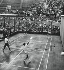 Doug Russell (left, far side) and Gordon Gray defeat Steve Baird and Chip Baird (right, near side) in five sets at the West Side Tennis Club in Forest Hills, Queens