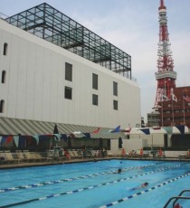 Courts on the roof of the Tokyo American Club. The Tokyo Tower, the tallest free-standing steel structure in the world, is at the right. The photograph was taken in the 2000s