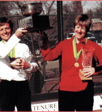 Sue Aery and Gerri Viant accept the trophy for the 2002 Women's Open National
Champions. Moments later, Sue addresses the crowd and announces her
retirement from platform tennis in order to pursue chiropractic school.